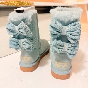 UGG Sheepskin Bow Back Boots in Pale Blue almost turquoise color